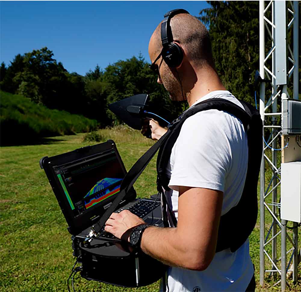 Engineer checking RF interference Image
